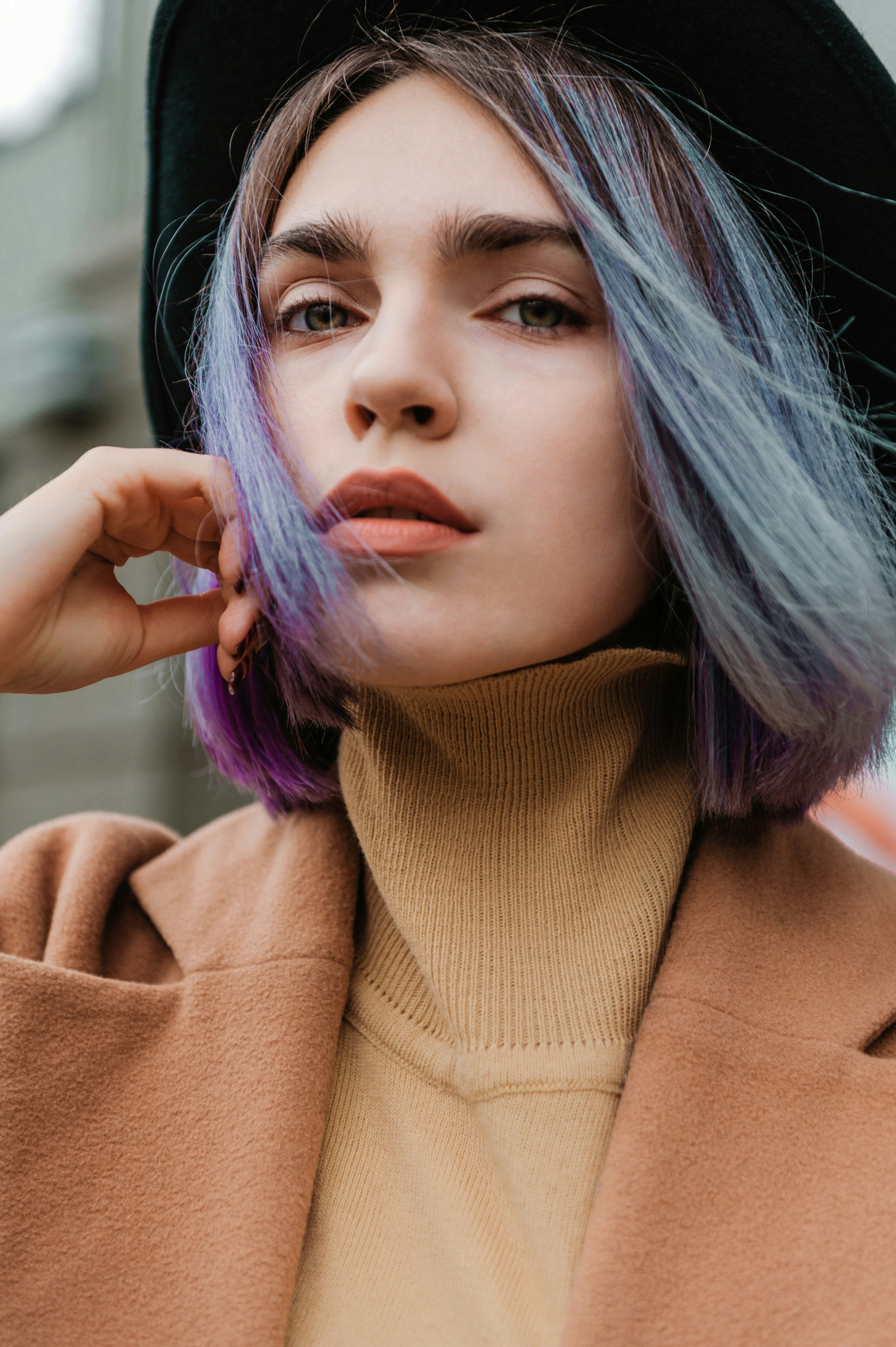 Woman with a pastel blue and lavender bob