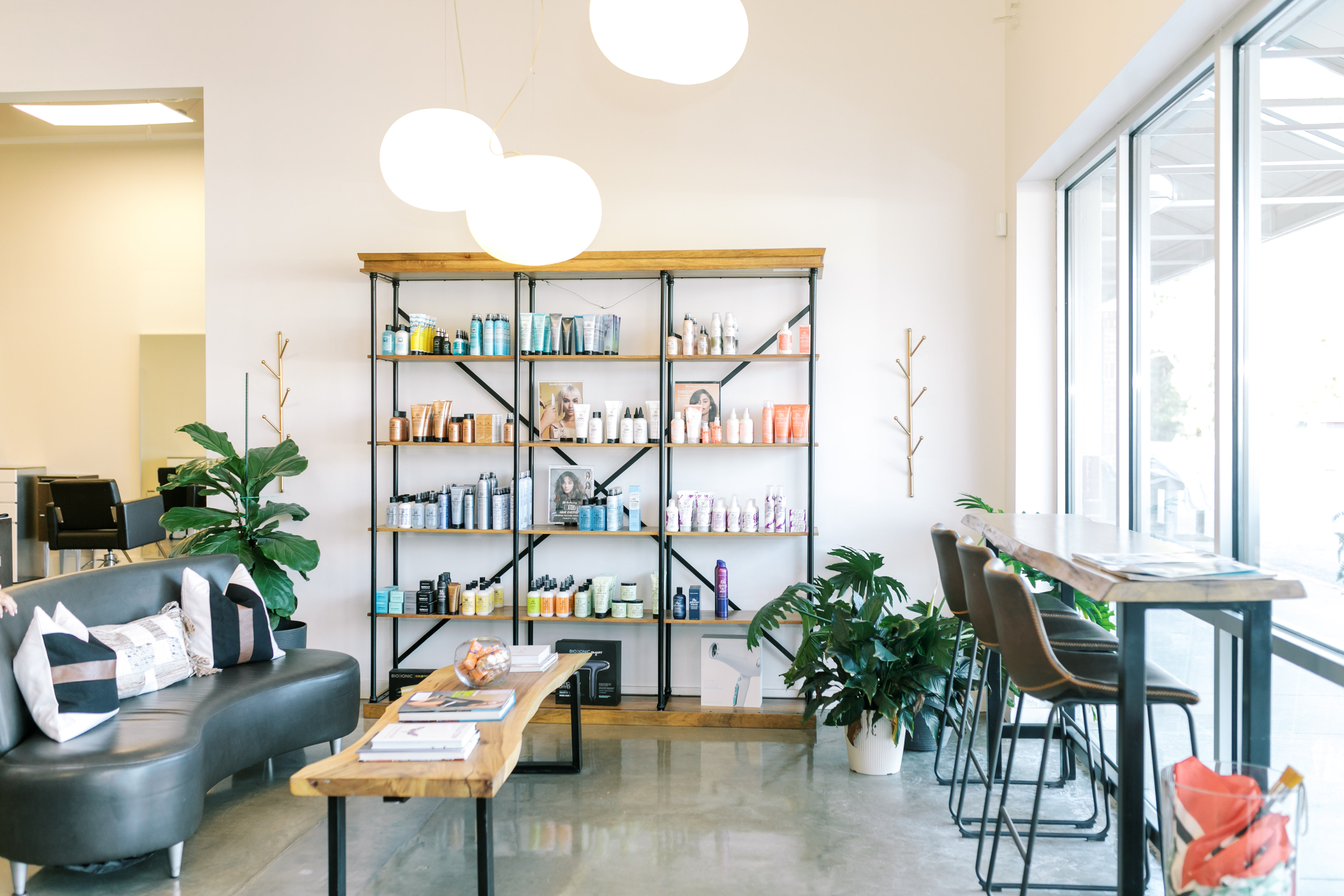 Product shelves in waiting area of Cumming location
